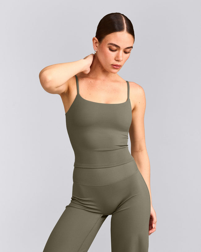 SoftMotion™ Strappy Mid Vest with Built in Bra Shelf with Grey Logo | Alpine Green