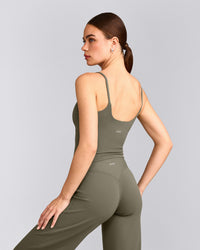 SoftMotion™ Strappy Mid Vest with Built in Bra Shelf with Grey Logo | Alpine Green