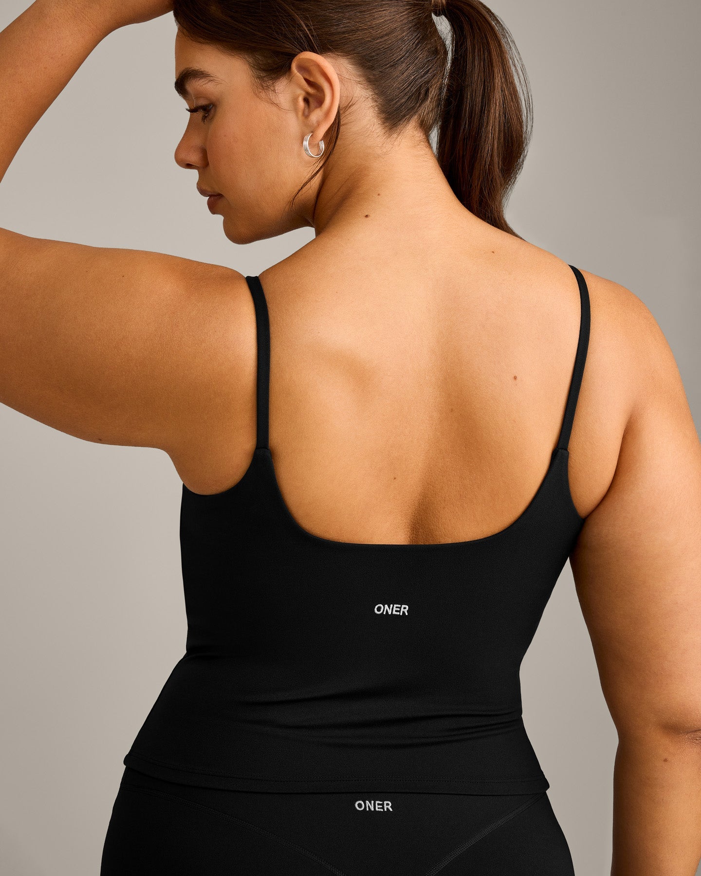 SoftMotion™ Strappy Vest with Built in Bra Shelf with Grey Logo | Black