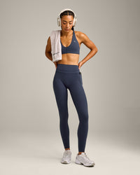 UnifiedMove High Waisted Pocket Leggings with Reflective Logo | True Blue
