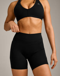 UnifiedMove High Waisted Pocket Shorts 6" with Reflective Logo | Black