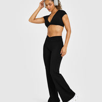 Unified Twist Front Short Sleeve Crop Top White Logo | Black