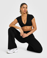 Unified Twist Front Short Sleeve Crop Top White Logo | Black