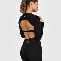 Unified Twist Front Long Sleeve Crop Top White Logo | Black