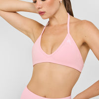 EnhanceLift™ Seamless Minimal Halter Neck Bralette with White Logo | Cherry Blossom Pink
