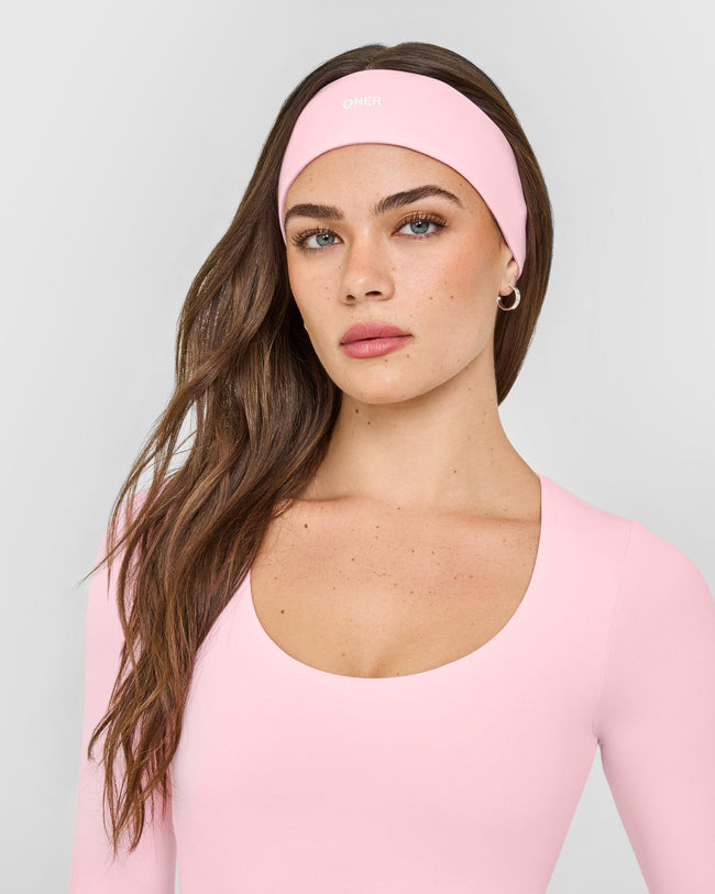 SoftMotion™ Headband with White Logo | Cherry Blossom Pink