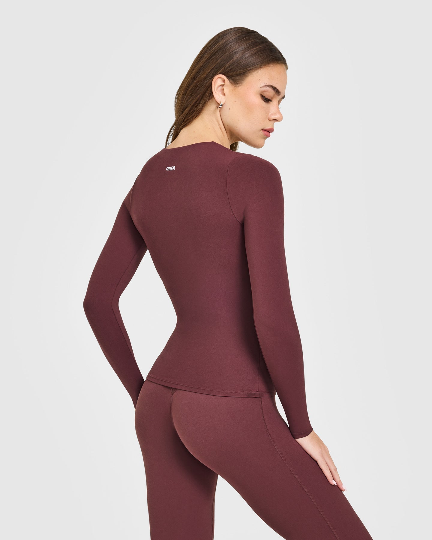 SoftMotion™ Scoop Neck Long Sleeve Top with Built in Bra Shelf with White Logo | Velvet Mocha