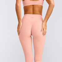 SoftMotion™ High Waisted Capri Leggings with Grey Logo | Peach Orange