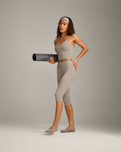 SoftMotion™ High Waisted Capri Leggings with White Logo | Warm Sand