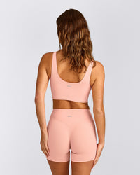 SoftMotion™ Longline Sports Bra with Grey Logo | Peach Orange