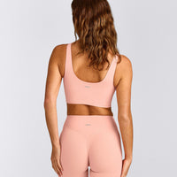 SoftMotion™ Longline Sports Bra with Grey Logo | Peach Orange