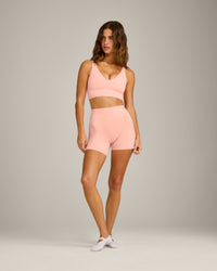 SoftMotion™ Longline Sports Bra with Grey Logo | Peach Orange
