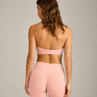 SoftMotion™ Minimal Halter Neck Bralette with Grey Logo | Peach Orange