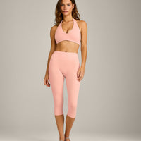 SoftMotion™ Minimal Halter Neck Bralette with Grey Logo | Peach Orange