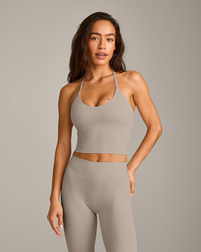 SoftMotion™ Strappy Halter Neck Mid Vest with Built in Bra Shelf with White Logo | Warm Sand