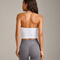 SoftMotion™ Strappy Halter Neck Mid Vest with Built in Bra Shelf with Grey Logo | White