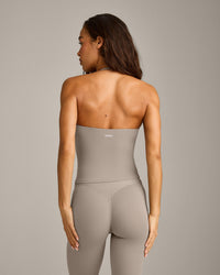 SoftMotion™ Strappy Halter Neck Vest with Built in Bra Shelf with White Logo | Warm Sand