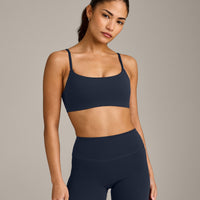SoftMotion™ Strappy Sports Bra with Grey Logo | True Blue