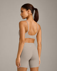 SoftMotion™ Strappy Sports Bra with White Logo | Warm Sand