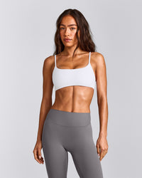 SoftMotion™ Strappy Sports Bra with Grey Logo | White