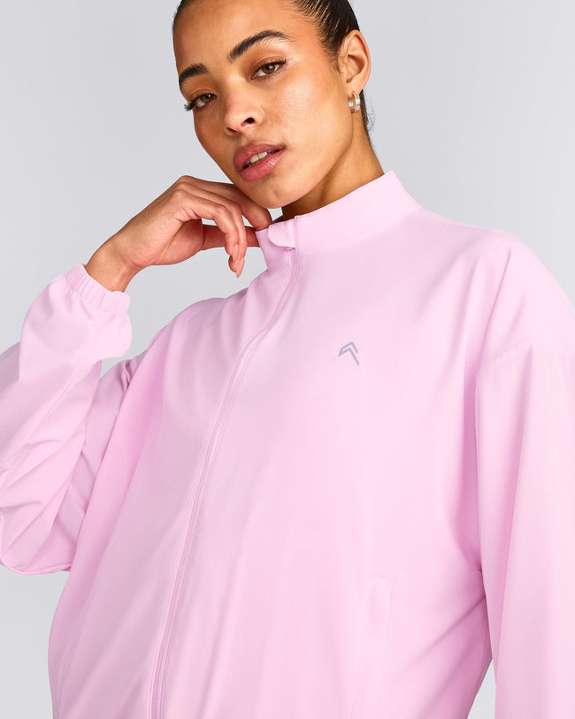 AirMove™ Jacket with Reflective Logo | Chalk Pink