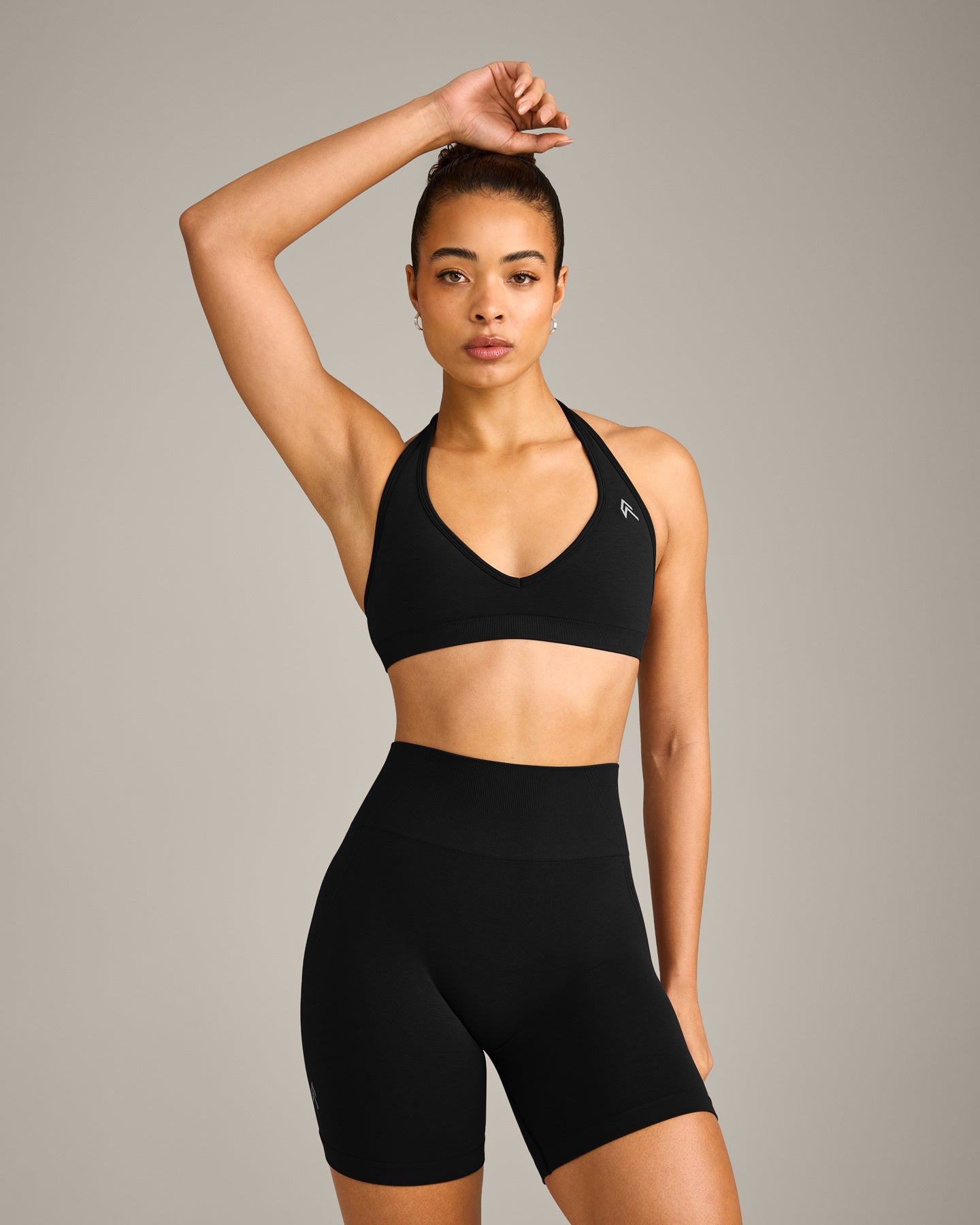 EffortlessLift™ Seamless Halter Neck Sports Bra with Grey Logo | Black