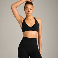 EffortlessLift™ Seamless Halter Neck Sports Bra with Grey Logo | Black
