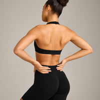 EffortlessLift™ Seamless Halter Neck Sports Bra with Grey Logo | Black