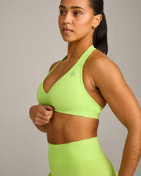 EffortlessLift™ Seamless Halter Neck Sports Bra with Grey Logo | Citrus Green