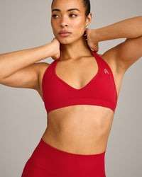 EffortlessLift™ Seamless Halter Neck Sports Bra with Grey Logo | Fiery Red