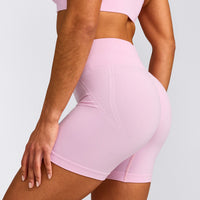 EffortlessLift™ Seamless Mid Rise Shorts with Grey Logo | Chalk Pink