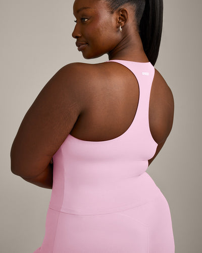 SoftMotion™ Racer Back Mid Vest with Built in Bra Shelf with Grey Logo | Chalk Pink