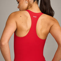 SoftMotion™ Racer Back Mid Vest with Built in Bra Shelf with Grey Logo | Fiery Red