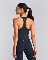 SoftMotion™ Racer Back Mid Vest with Built in Bra Shelf with Grey Logo | True Blue