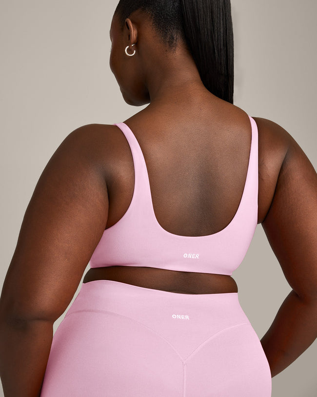SoftMotion™ Scoop Back Bralette with Grey Logo | Chalk Pink