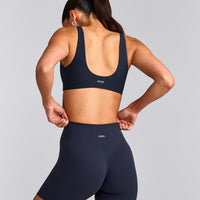 SoftMotion™ Scoop Back Bralette with Grey Logo | True Blue