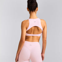 SoftMotion™ High Neck Sports Bra with Gray Logo | Soft Girl Pink
