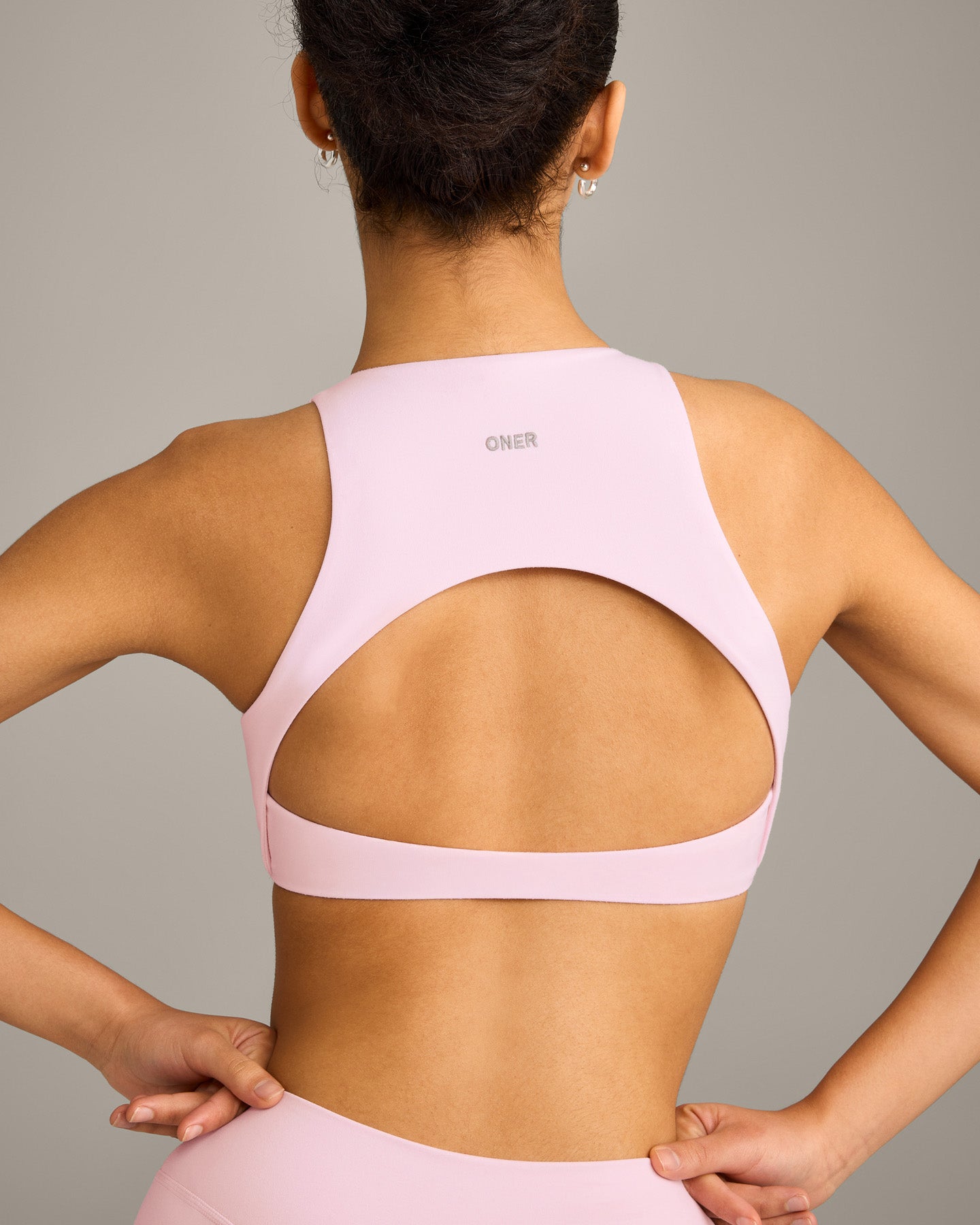 SoftMotion™ High Neck Sports Bra with Grey Logo | Soft Girl Pink
