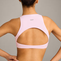 SoftMotion™ High Neck Sports Bra with Grey Logo | Soft Girl Pink