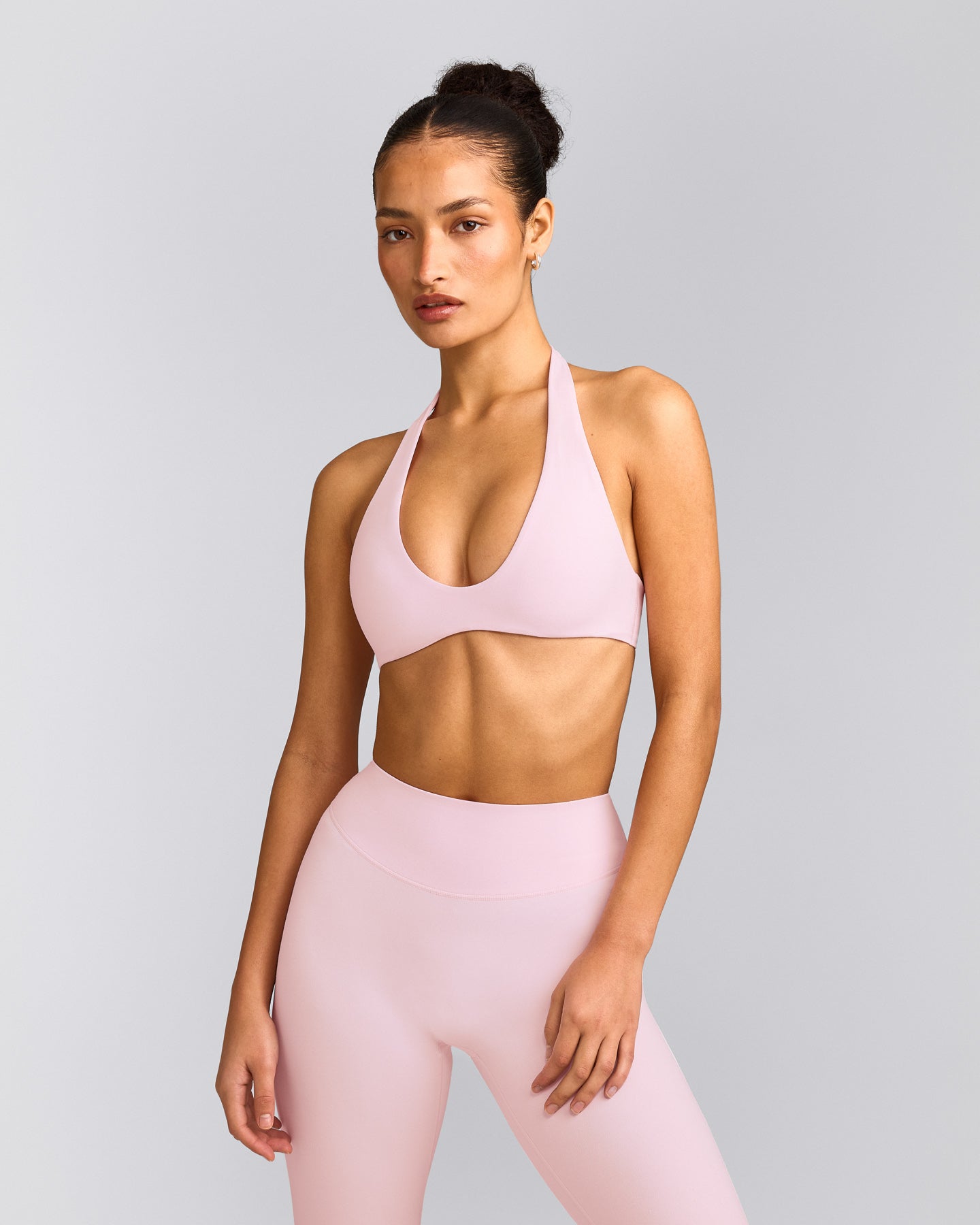 SoftMotion™ Minimal Halter Neck Bralette with Grey Logo | Soft Girl Pink