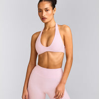 SoftMotion™ Minimal Halter Neck Bralette with Grey Logo | Soft Girl Pink