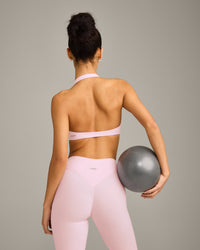 SoftMotion™ Minimal Halter Neck Bralette with Grey Logo | Soft Girl Pink