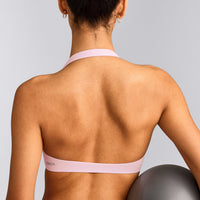 SoftMotion™ Minimal Halter Neck Bralette with Grey Logo | Soft Girl Pink
