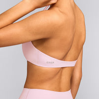 SoftMotion™ Minimal Halter Neck Bralette with Grey Logo | Soft Girl Pink