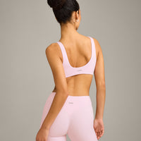 SoftMotion™ Scoop Back Bralette with Grey Logo | Soft Girl Pink