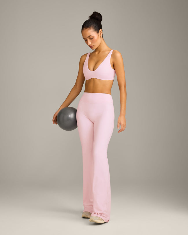 SoftMotion™ Scoop Back Bralette with Grey Logo | Soft Girl Pink
