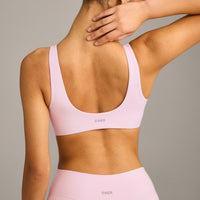 SoftMotion™ Scoop Back Bralette with Grey Logo | Soft Girl Pink