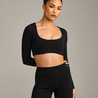 SoftMotion™ Scoop Neck Long Sleeve Crop Top with Built in Bra Shelf with Grey Logo | Black