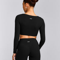 SoftMotion™ Scoop Neck Long Sleeve Crop Top with Built in Bra Shelf with Grey Logo | Black