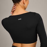 SoftMotion™ Scoop Neck Long Sleeve Crop Top with Built in Bra Shelf with Grey Logo | Black